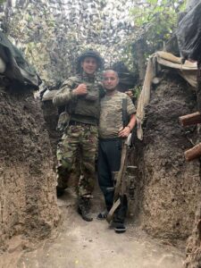 Назар з побратимом у бліндажі