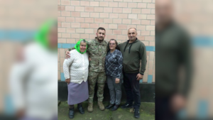 Олександр із сімєю.