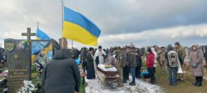 Прощання на кладовищі