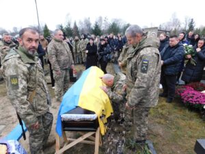 Прощання на кладовищі